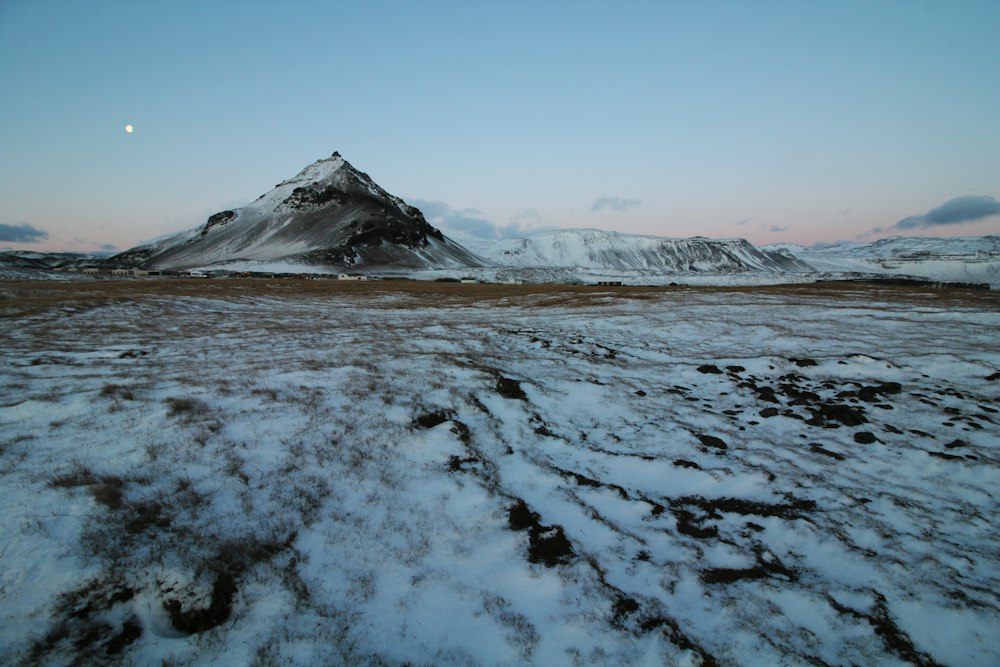A frozen lake below a mountain near Arnarstapi
